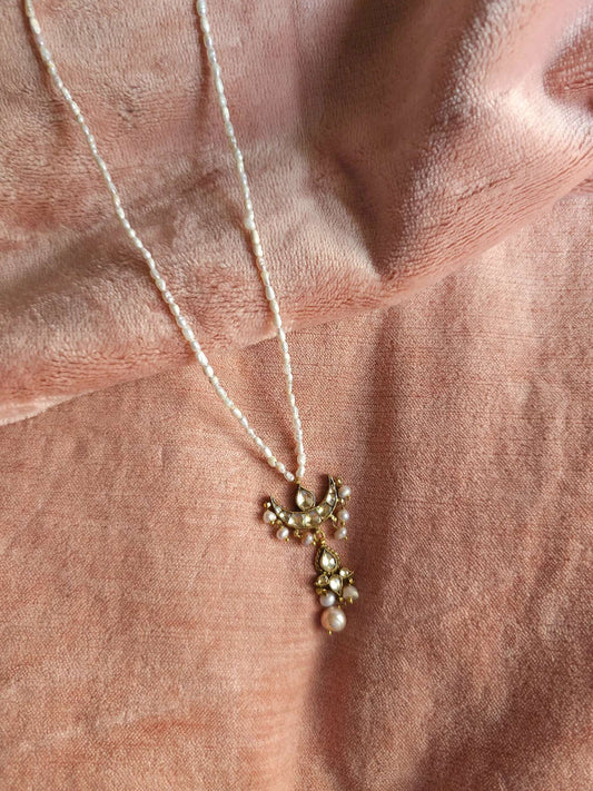 Golden moon pendant necklace