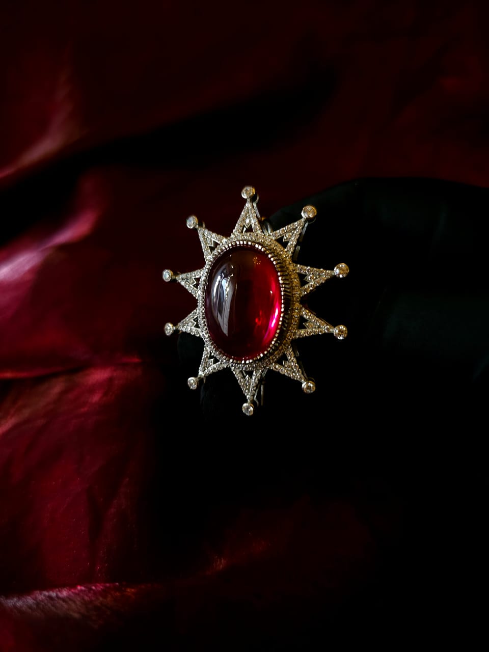 Rajaratna silver brooch