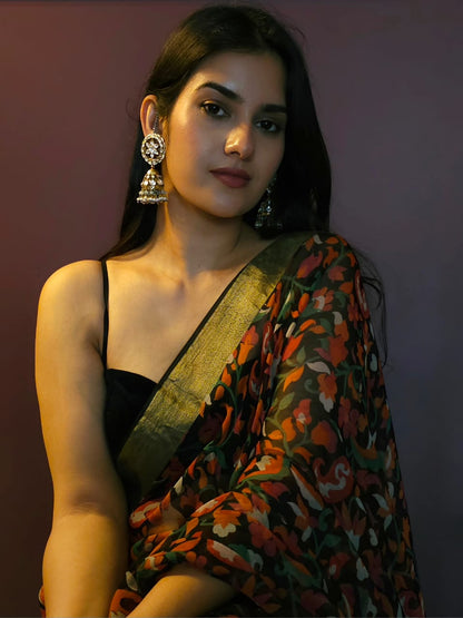 Totem jhumka earrings