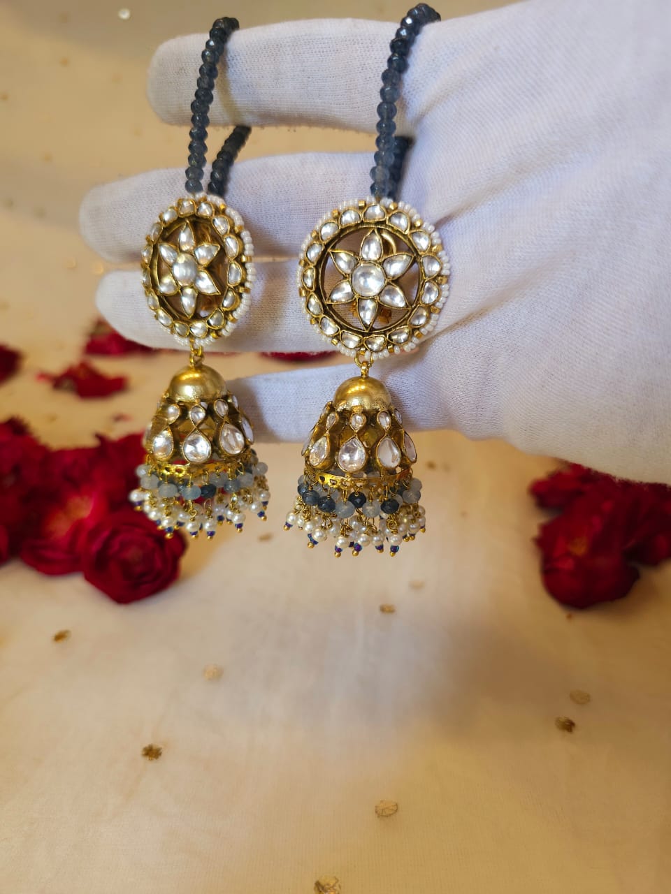 Totem jhumka earrings