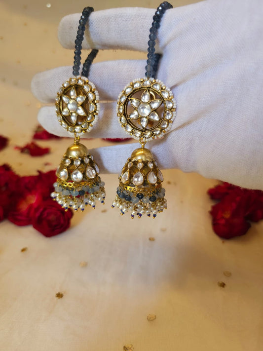 Totem jhumka earrings