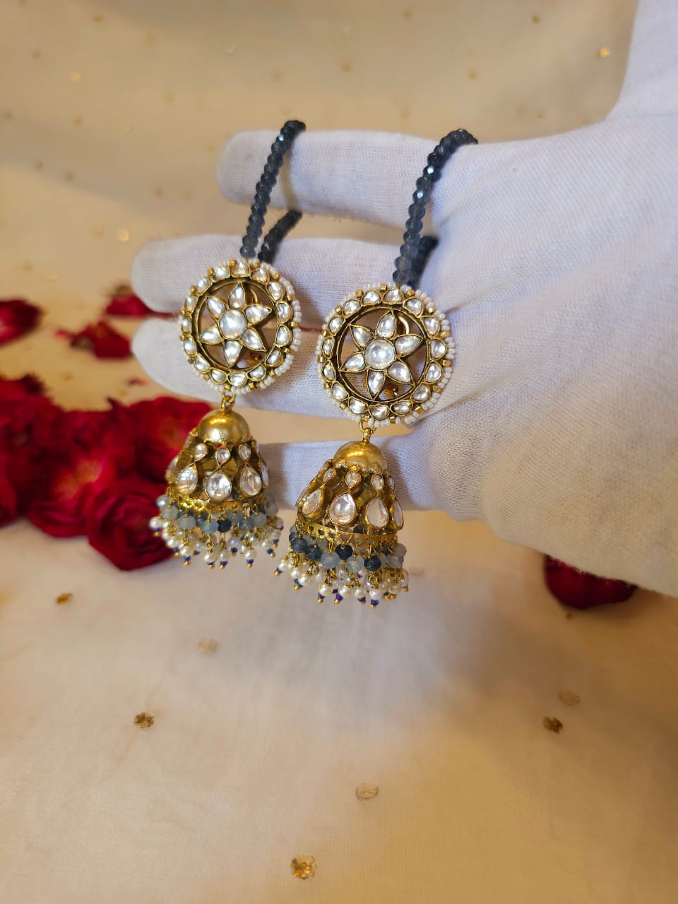 Totem jhumka earrings