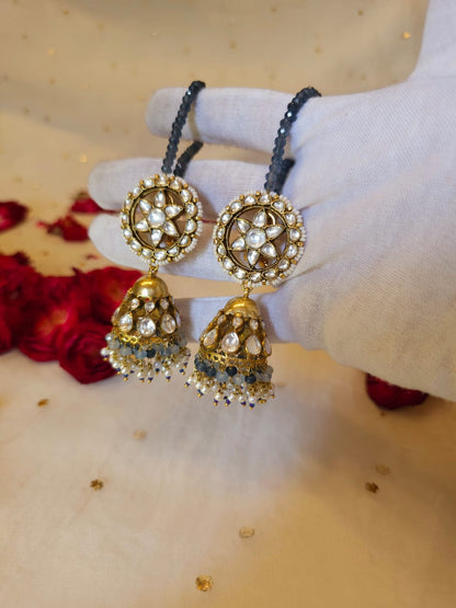 Totem jhumka earrings