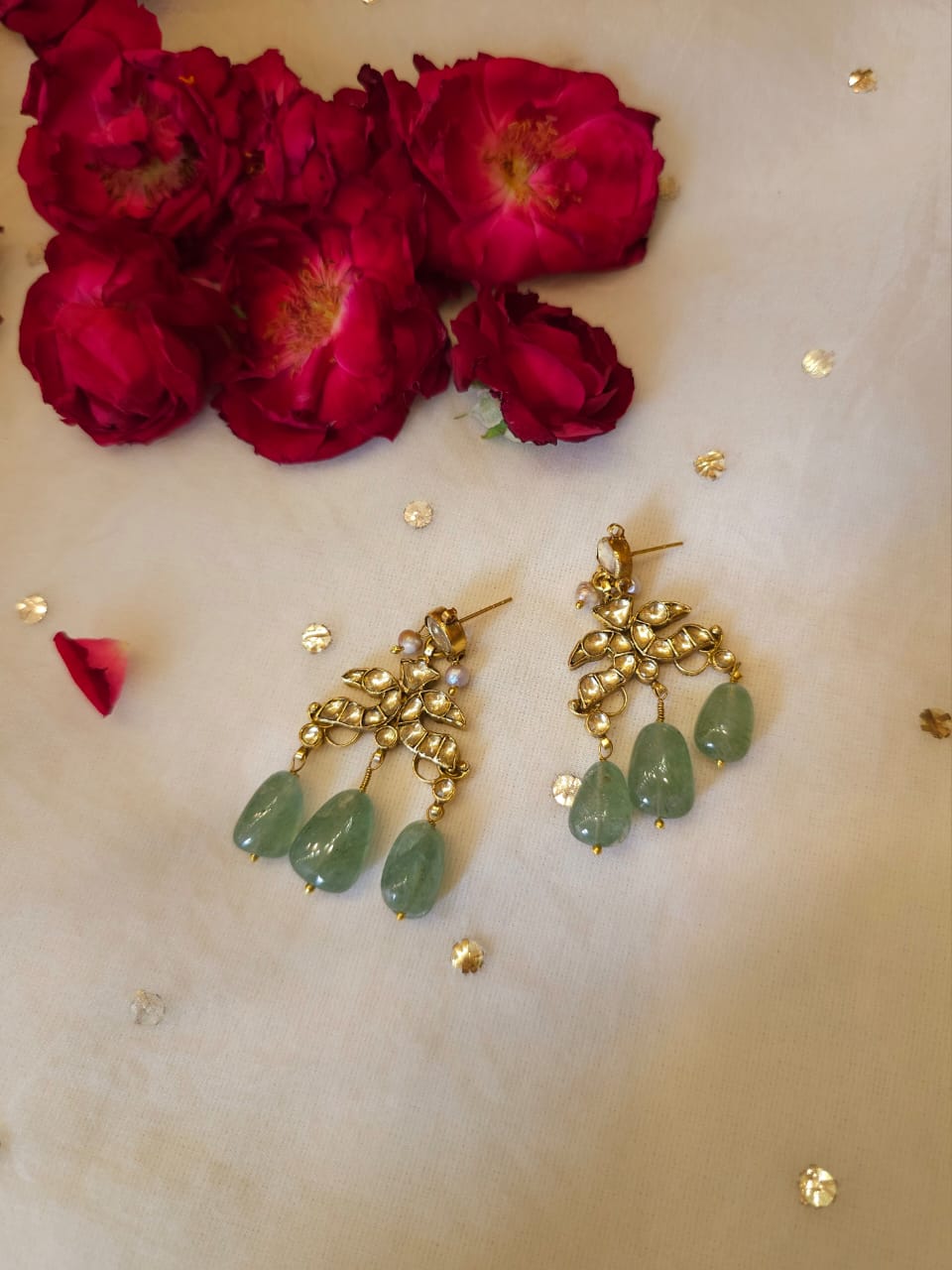 Twin peacock earrings