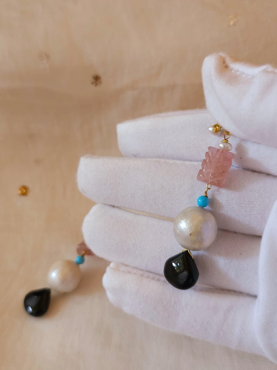 Carved rose quartz and black onyx earrings