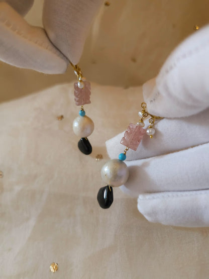 Carved rose quartz and black onyx earrings