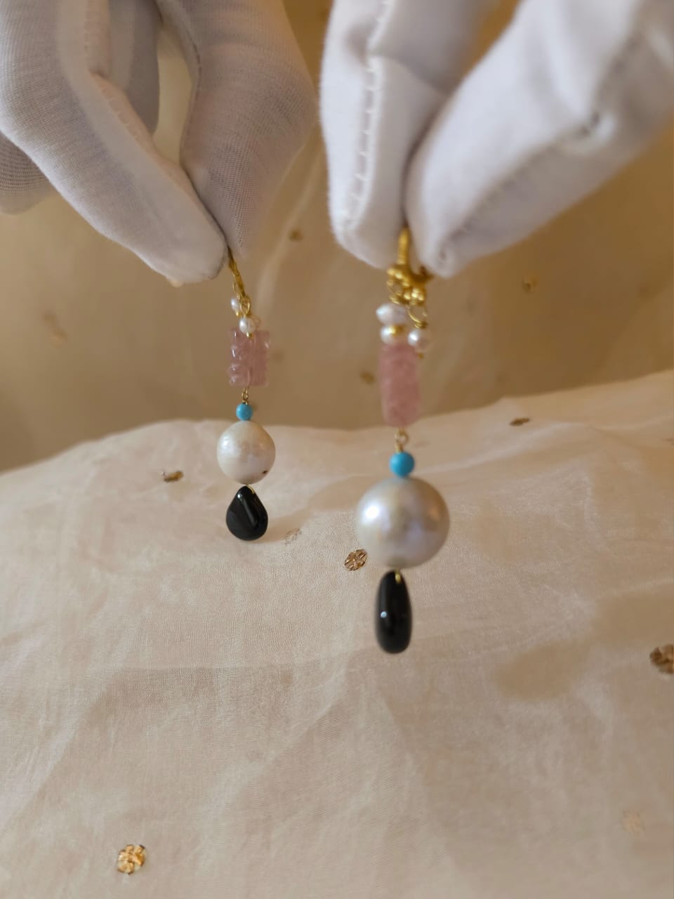Carved rose quartz and black onyx earrings