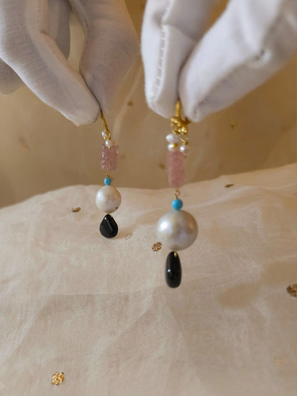 Carved rose quartz and black onyx earrings
