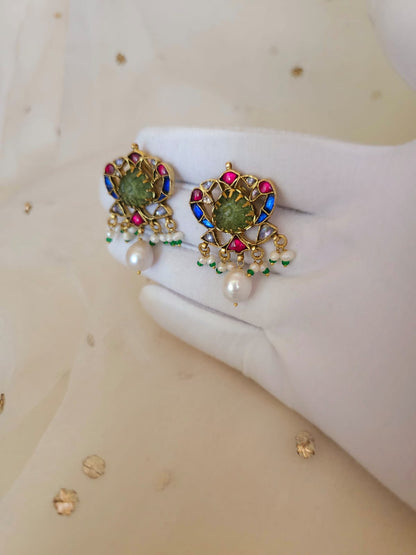 The sacred blue peacock pearl studs