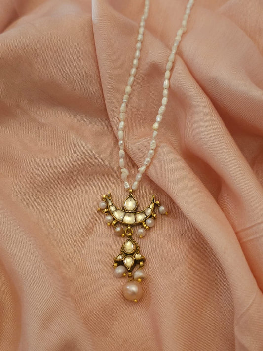 Golden moon pendant necklace