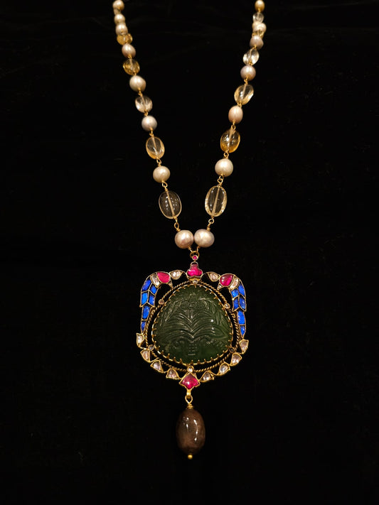 The sacred blue peacock necklace