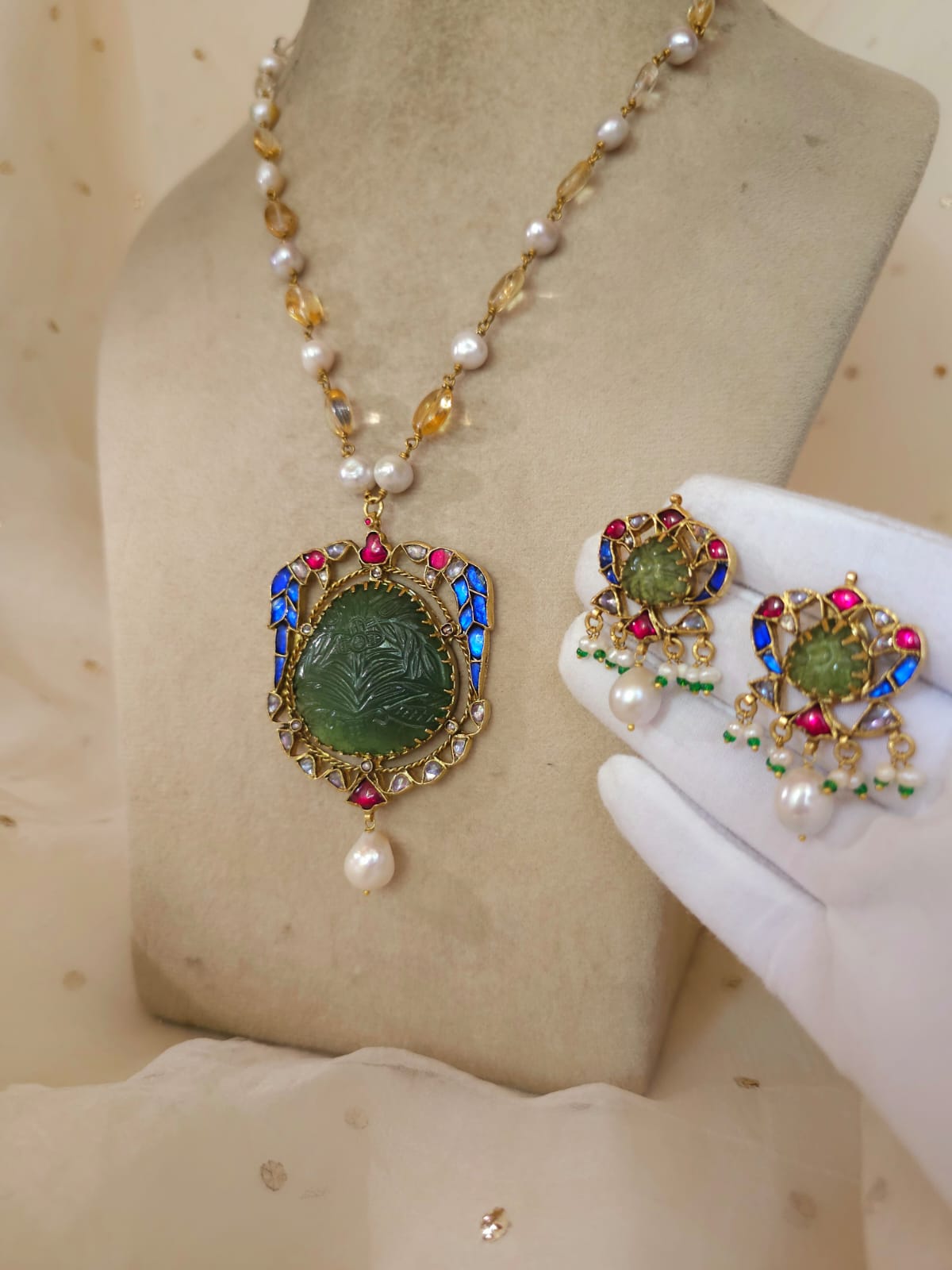 The sacred blue peacock pearl studs