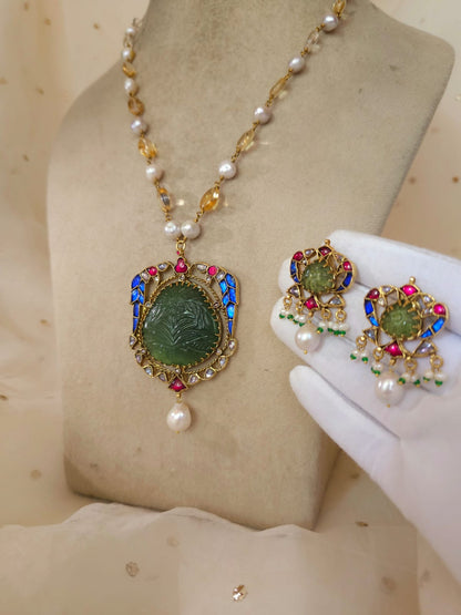 The sacred blue peacock pearl studs