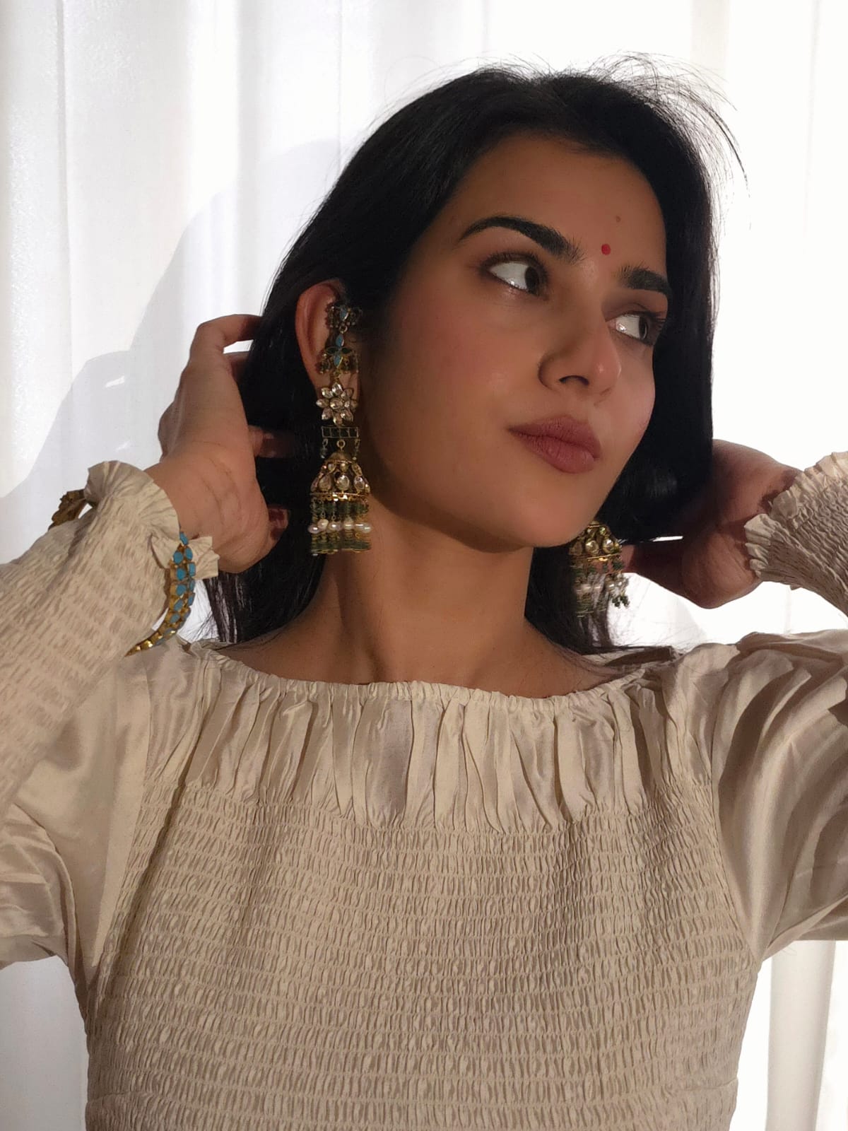 Green regalia jhumkas