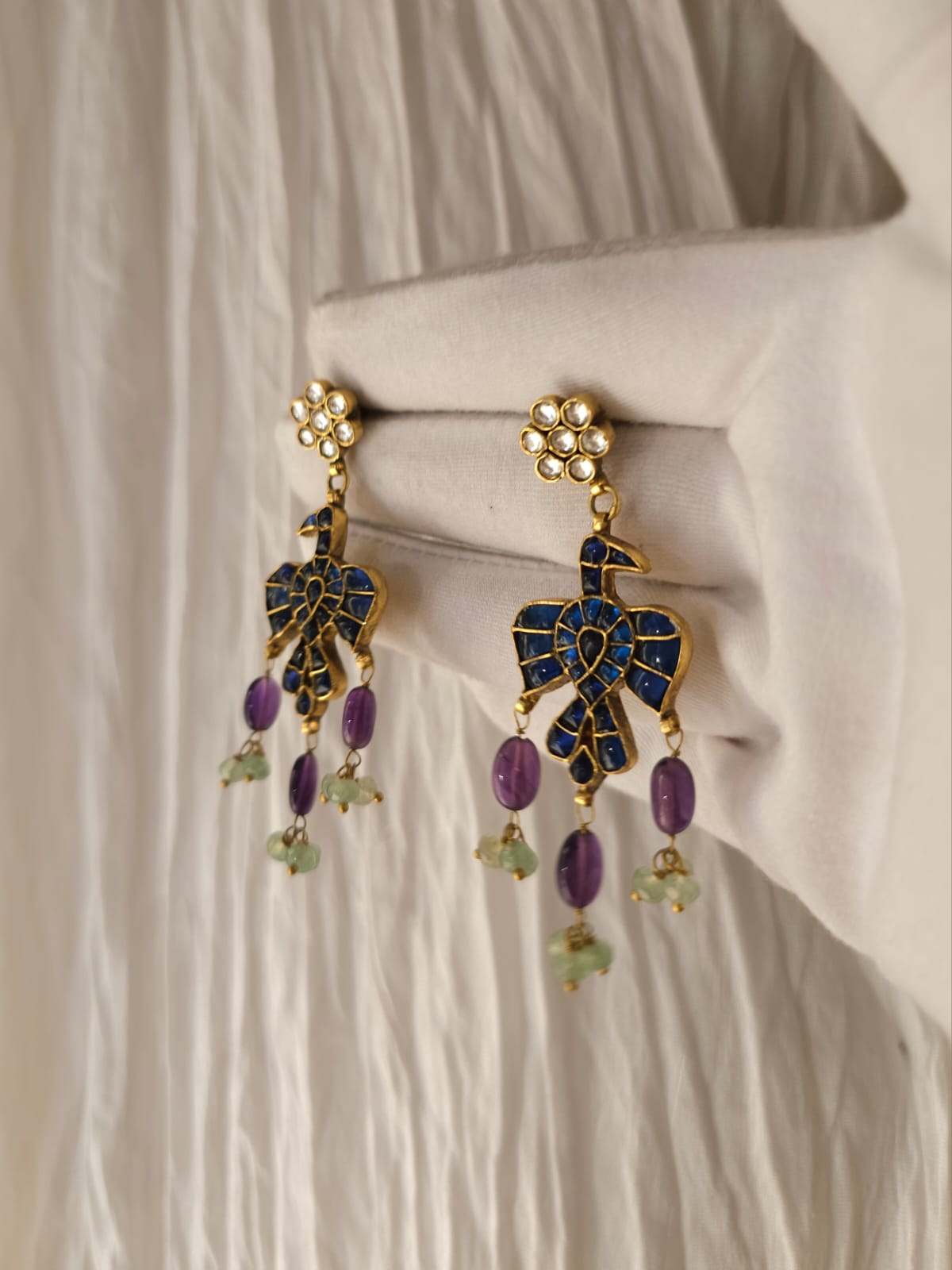 Chilling hawk amethyst earrings